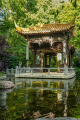 In the Chinese "Garden of Fragrance and Splendor". The different seasons are symbolically represented. The large pavilion by the water represents summer