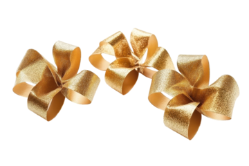 Golden gift bow isolated on transparent background. Gold bow and ribbon isolated on white background.