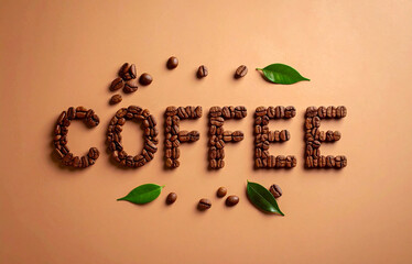 flatlay ot the word coffee, made of coffee beans on a brown background