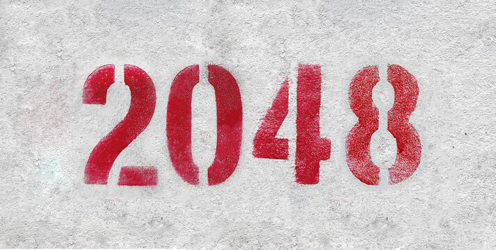 red spray-painted number 2048 sprayed onto a white wall.