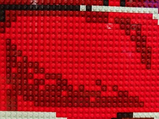 Obraz premium Jul 28, 2025 - Hong Kong, China: Red Lego bricks form a large heart in a Hong Kong shopping mall shop display.