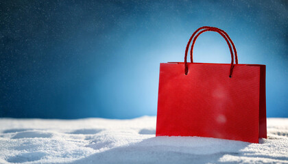 Red shopping bag in snow, mockup, Christmas and New year sale and discount. Snowy winter landscape