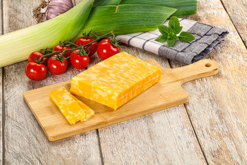 Marble yellow cheese with slices