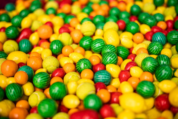jelly candies with different flavors in the forms of multi-colored fruits in a confectionery