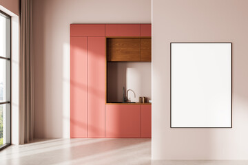 Minimalist kitchen interior with pink cabinets and blank framed poster on light wall for modern design presentation template concept display mockup. 3D Rendering