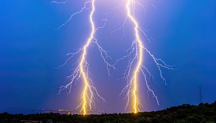 Yellow Lightning Striking Earth at Night