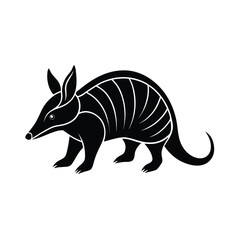 A solitary armadillo walks slowly in a stark black silhouette against a clean white background
