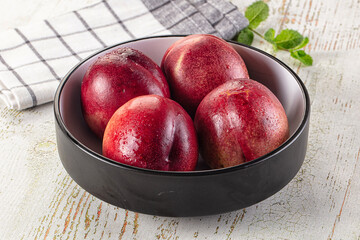 Ripe sweet juicy nectarines heap