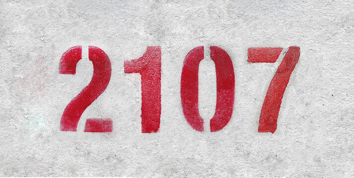 number 2107 . Red spray paint the white wall