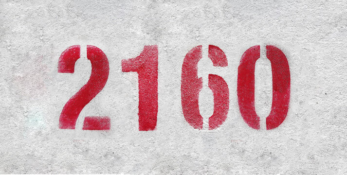Red Number 2160 on the white wall. Spray paint.
