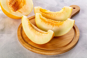 Ripe sweet juicy melon with slices