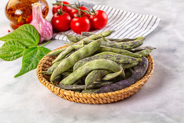 Raw green bean strips heap