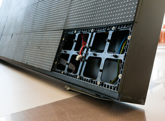 LED perimeter cabinet of a sports field with two broken LED modules