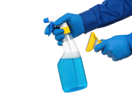 A person wearing blue gloves holds a spray bottle filled with blue liquid and a yellow squeegee against a black background.