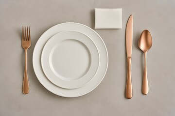 Minimalist Tableware Layout with Gold Flatware on Neutral Background