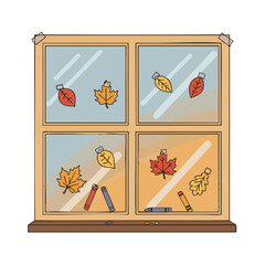 School window with leaf cut-outs and crayons for fall