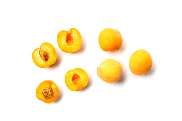 Fresh ripe apricots on a white background.
