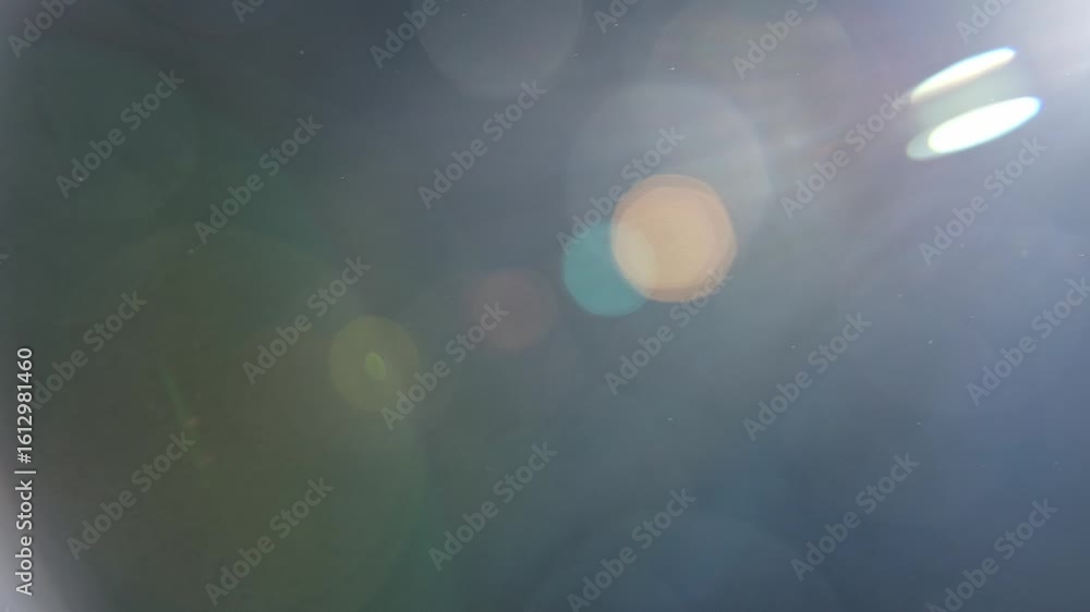 Poster real flare lens that is easy to use in blend or overlay modes.