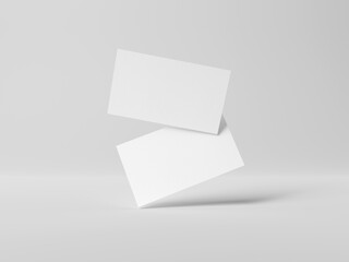 Two business cards floating on white background Mockup. Blank american size calling card. 3D rendering