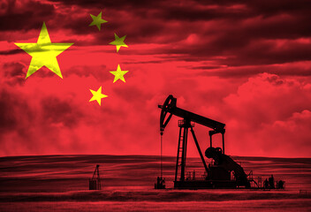 Drilling for oil in the countryside with Chinese national flag overlay