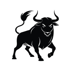 Powerful black silhouette of an angry bull in a fierce charge pose