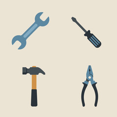 Illustration of four common hand tools on a light background