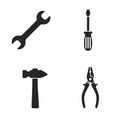 Set of four basic hand tools in black silhouette on white background
