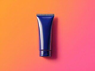 "Cosmetic Tube Mockup! Empty Dark Blue Tube on Vibrant Orange & Pink Gradient Background - Modern Branding Template"