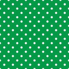 Green background vector seamless pattern or tile texture. White polka dots on pastel, colorful fresh spring green background.
