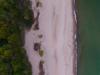 Top view of the beach in Sopot with a river flowing into the sea. Poland