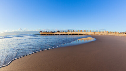 Beach Pier Jetty Ocean Waters Edge  Blue Sky Landscape