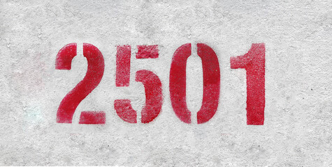 red spray-painted number 2501 sprayed onto a white wall.