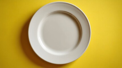 A white plate with a yellow background.
