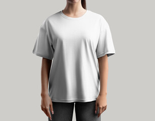Oversized white t-shirt mockup on a girl in dark jeans, front view, casual wear for design, print,...
