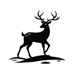 Elegant black silhouette of a reindeer walking through a snowy landscape