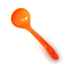 Orange plastic spoon