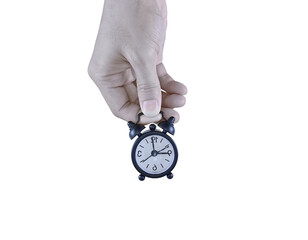 A close-up of a human hand holding a small clock, symbolizing the importance of time. The image...