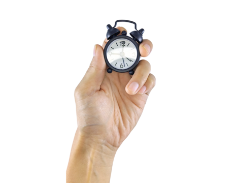 Hand gripping a miniature analog clock, isolated on a white background. This visual metaphor illustrates how valuable time is in daily life and decision-making.