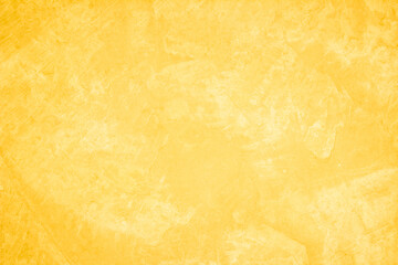 Yellow concrete stone texture for background in summer wallpaper. Cement and sand wall of tone vintage minimal. Concrete abstract wall of light yellow color, cement texture white blank for home decor.