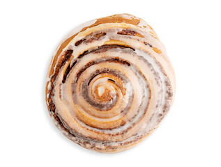 Fototapeta premium Top view of single delicious sweet homemade cinnamon roll bun glazed with sugar icing isolated on white background freshly baked for morning breakfast as pastry dessert or seasonal comfort food