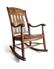 Single wooden rocking chair with curved backrest and footrest on gray background. Chair legs are visible creating balanced composition. Rustic charm highlighted.
