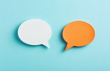 White and orange dialogs on blue background. Flat lay top view, discussion template. Communication concept, place for talk, idea and text