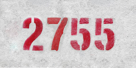 number 2755 . Red spray paint the white wall