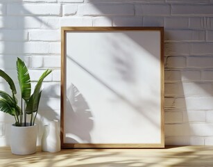 Wooden frame mockup leans white wall with sunlight shadows and green house plants