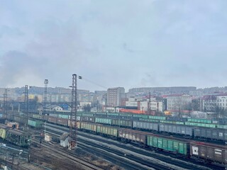 The railway station, freight trains in a cloudy spring day, Murmansk, Russia
