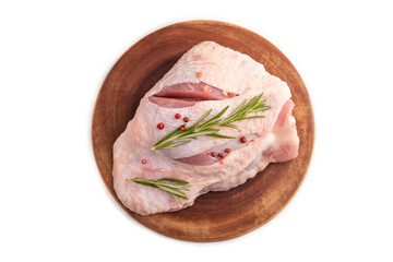 Raw Turkey Thigh with spices on cutting board isolated on white. top view, flat lay, close up