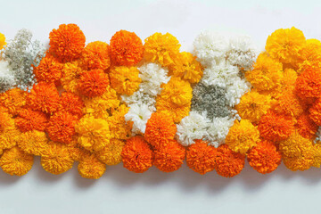 Marigold flower rangoli on white background for diwali or dasara festival in hinduism