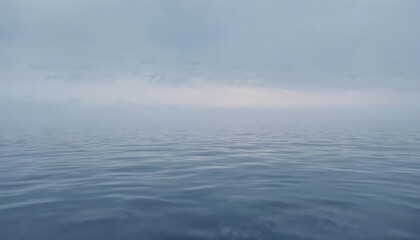 Vast ocean expanse under gray cloudy sky. Calm blue water shows subtle ripples and distant boats. Serene seascape, horizon line emphasizes endlessness, peaceful atmosphere for travel or meditation.