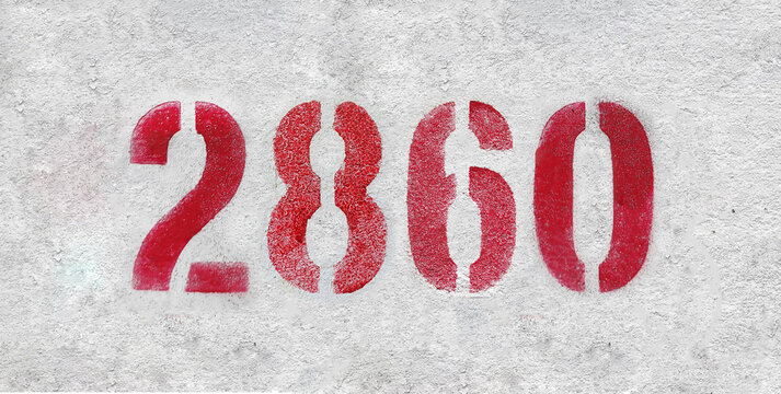 number 2860 . Red spray paint the white wall