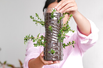 Close Up Of Sustainable Home Gardening Project, Demonstrating Creative Reuse Of Plastic Waste
